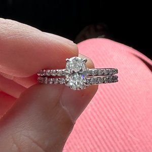 Engagement ring and wedding band (soldered together by jeweler).